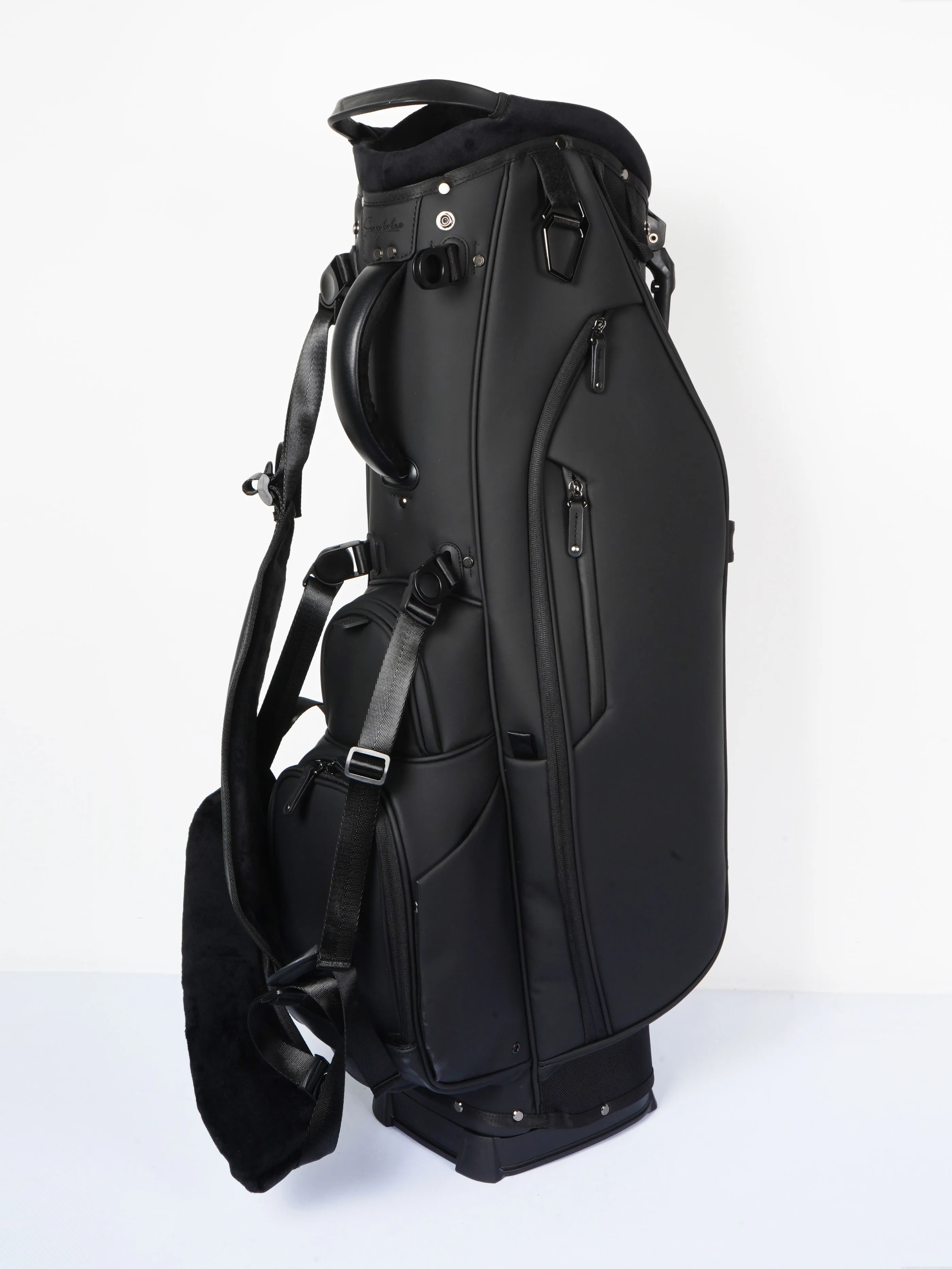 Custom golf bag production run in coordinated colorways lined up for tiered quotation and inspection